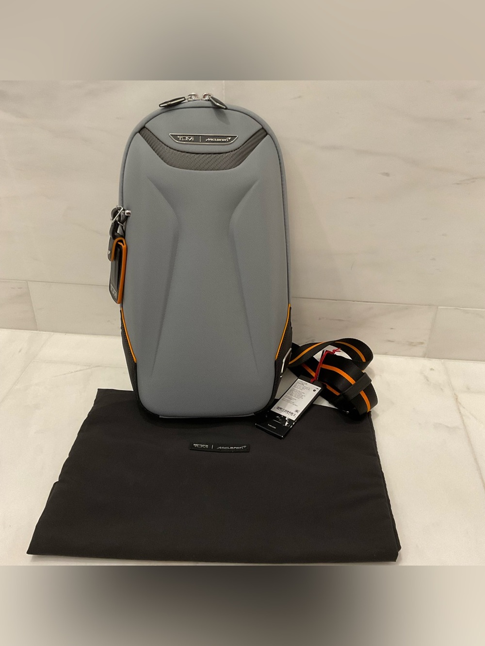 NEW Tumi McLaren TORQUE 14” Sling Crossbody Bag - SUPER GREY with PAPAYA ORANGE